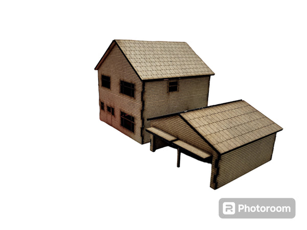 This Laser Cut 1:76 Scale 1970s Detached Houses complete with a 2 Garage In MDF