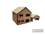 This Laser Cut 1:76 Scale 1970s Detached Houses complete with a 2 Garage In MDF